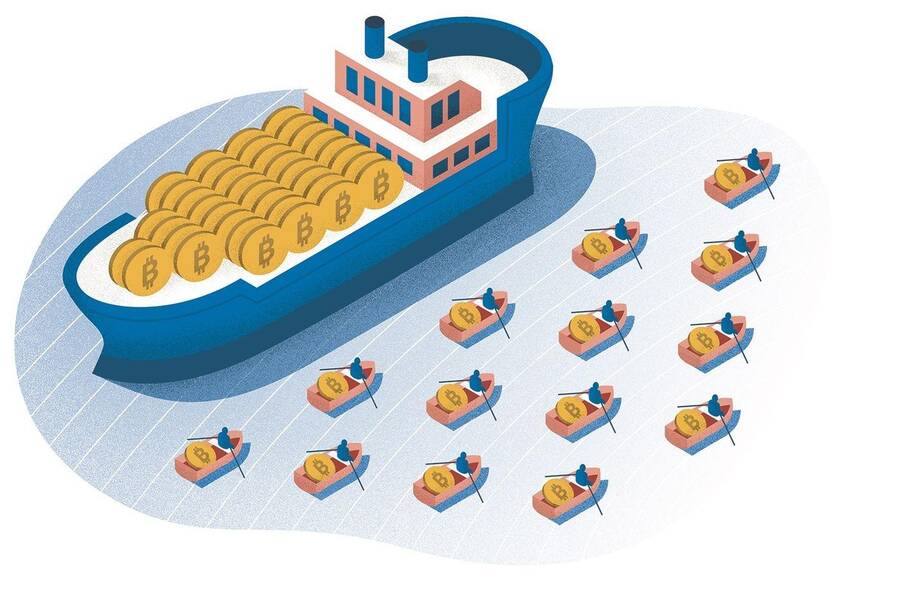 A cryptocurrency tanker is flanked by small boats.