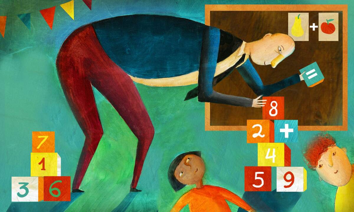 a math teacher uses blocks to teach.