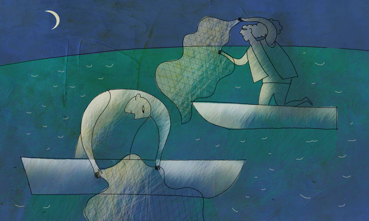 A man and a women cast nets into the water.