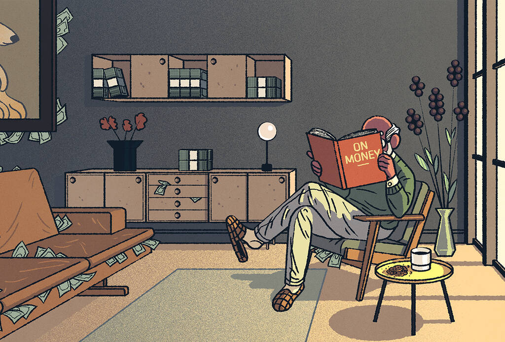 Man reading financial literacy book in living room.