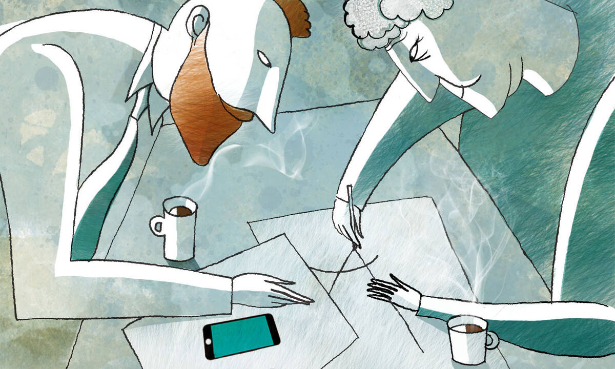 Older and younger employees collaborate.