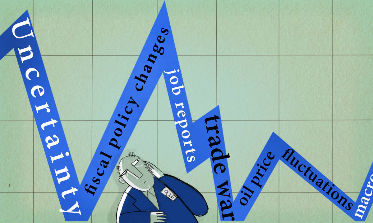 A trader looks at a volatile stock market chart made up of newspaper headlines.