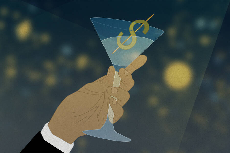 martini glass with dollar sign skewer