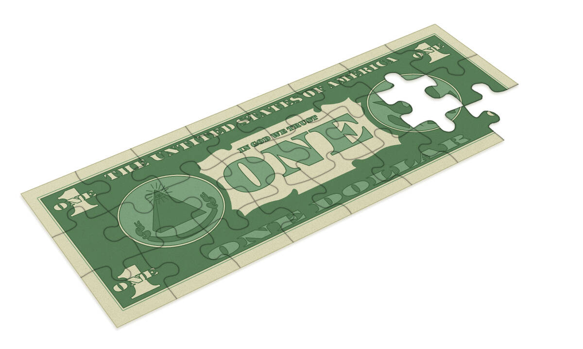 US one dollar bill as puzzle with missing pieces