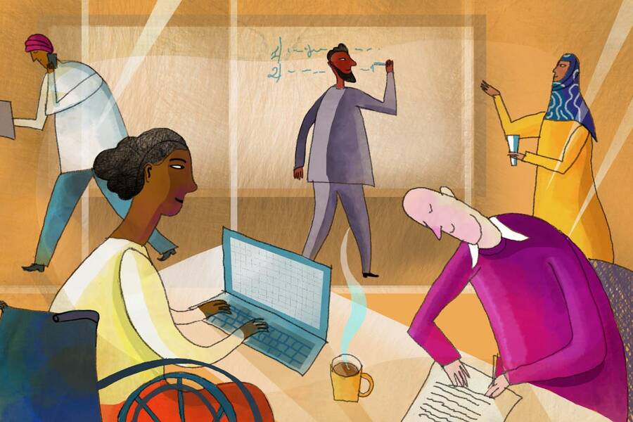 five people work in an office