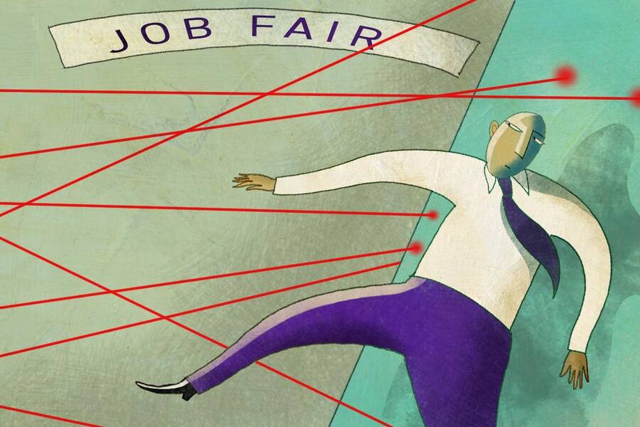 a man attending a job fair navigates laser sensors