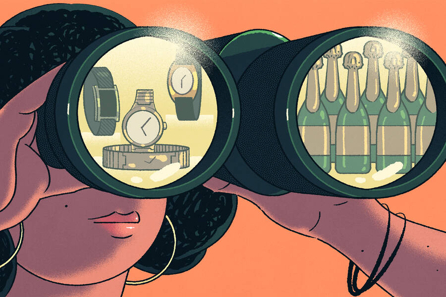 person looking through binoculars at luxury products