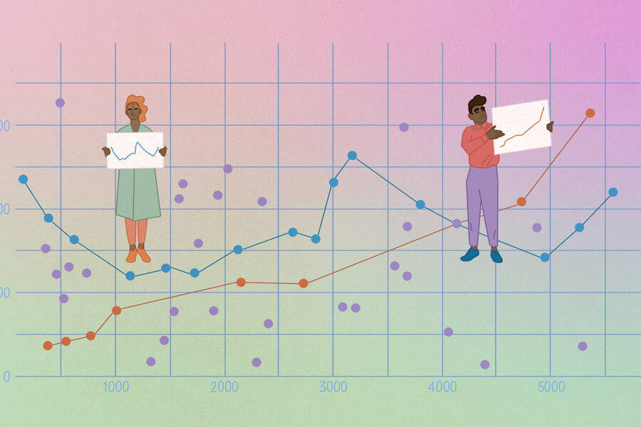 two people stand on a scatterplot grid
