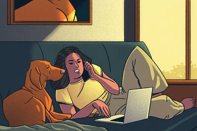 woman working from home couch with dog