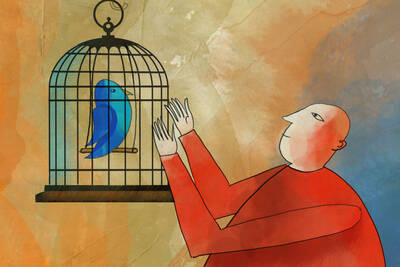 person looking at blue bird in cage
