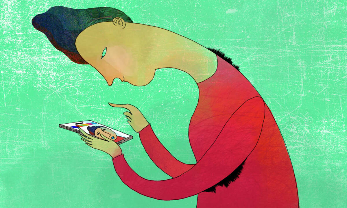 person testing virtual reality app on phone