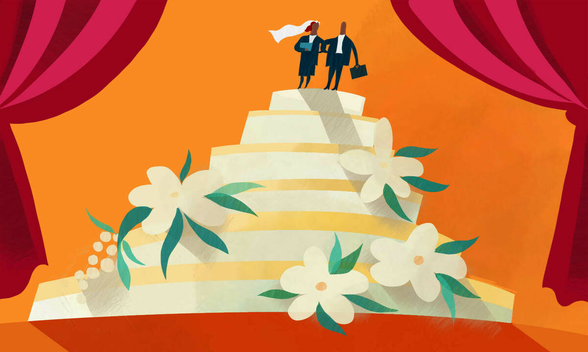 business power couple atop wedding cake
