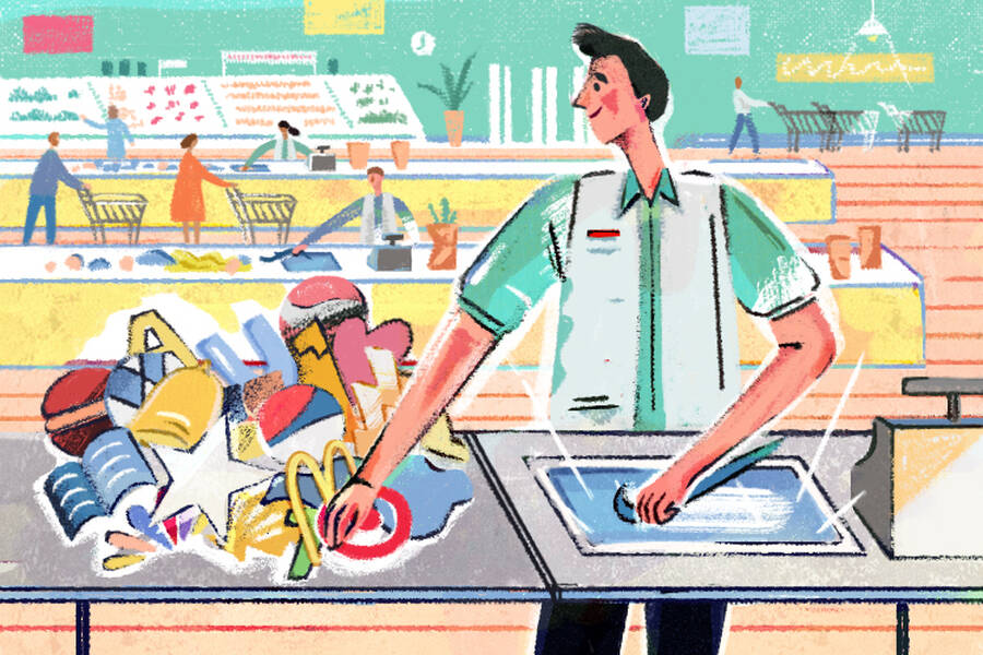 A clerk scans brand trademarks.