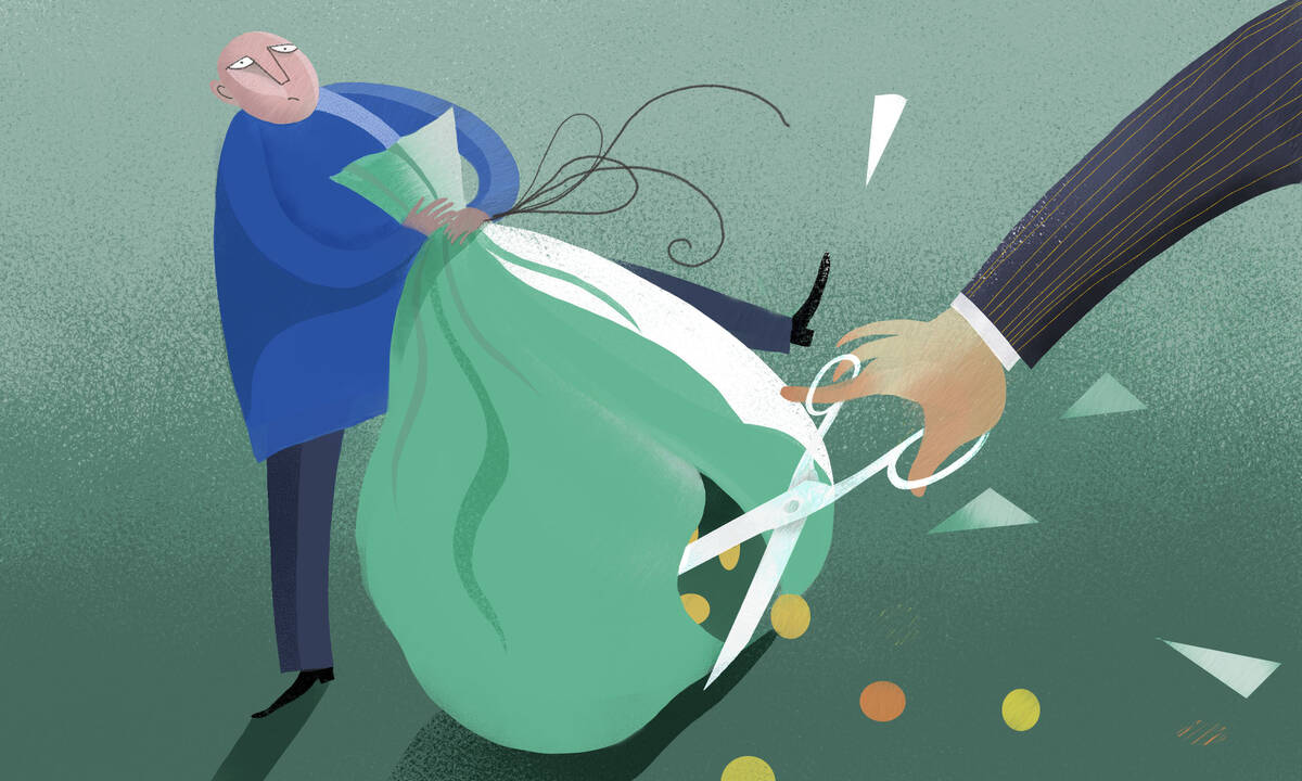 person holding bag while another person cuts it with scissors as coins fall out.