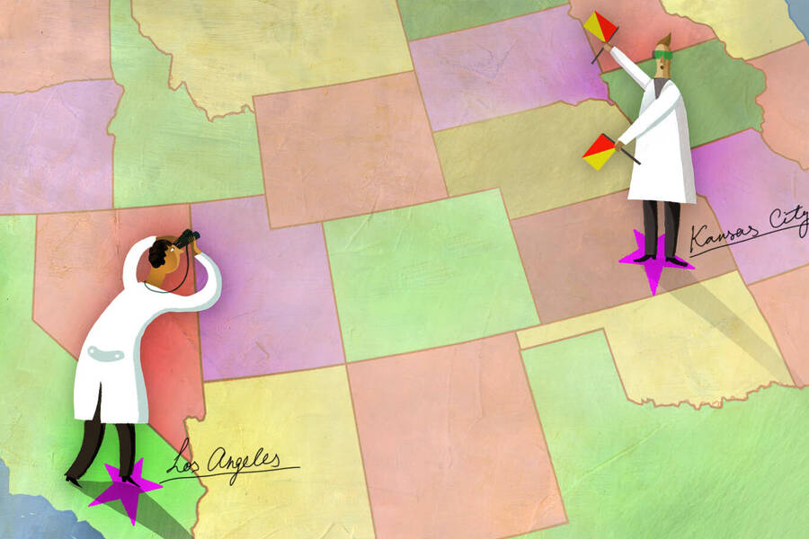 two scientists communicate between Los Angeles and Kansas City using semaphore flags.