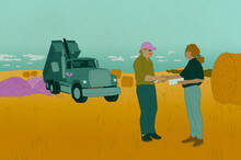 farmer shaking hands with dumptruck driver who has just delivered a load of fertilizer