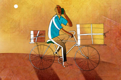 An African entrepreneur delivers products on a bicycle.